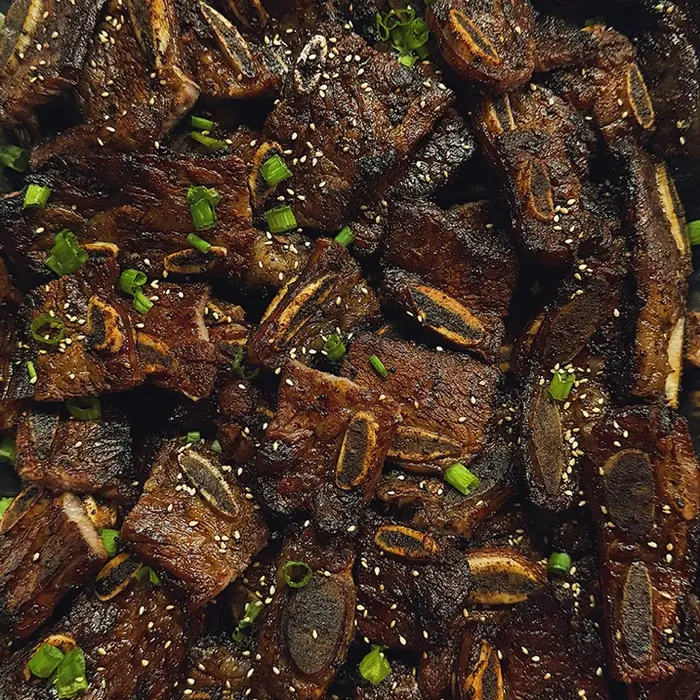 Tray of grilled kalbi short ribs